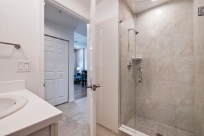 Shower, hair dryer, towels