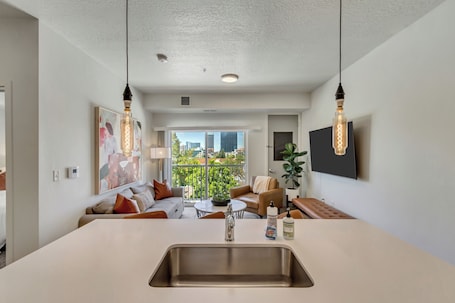 Living area. LCF - Downtown SLC - King + Sleeper - Gym - Sleeps 4 - Garage