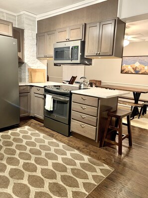 Fridge, microwave, dishwasher, coffee/tea maker