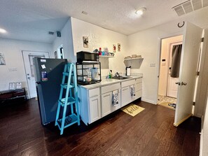 Fridge, microwave, coffee/tea maker, toaster