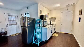 Fridge, microwave, coffee/tea maker, toaster