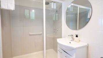 Shower, rainfall showerhead, eco-friendly toiletries, hair dryer