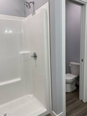 Combined shower/bathtub, hair dryer, towels, soap - Brand new beautiful home with best view outside of Waterton Park. LOWER suite. (Mountain View)
