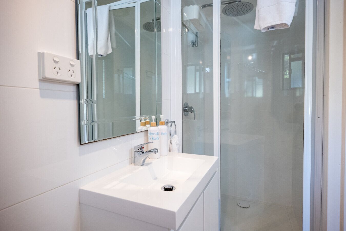 Shower, eco-friendly toiletries, hair dryer, towels
