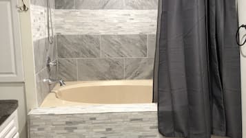 Shower, jetted bath, shampoo