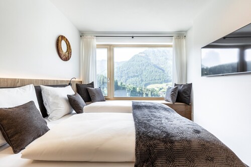 Moderne Ferienwohnung 'Ravison' mit Bergblick, Garten und WLAN
