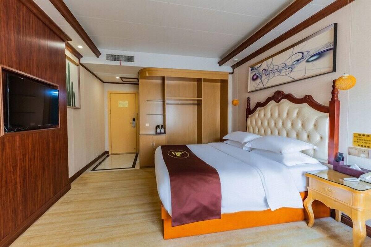 Habitación Business | Cortinas opacas, wifi gratis, ropa de cama