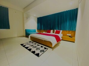 Deluxe Room | Bed sheets - Hotel Prime (Gandhinagar)