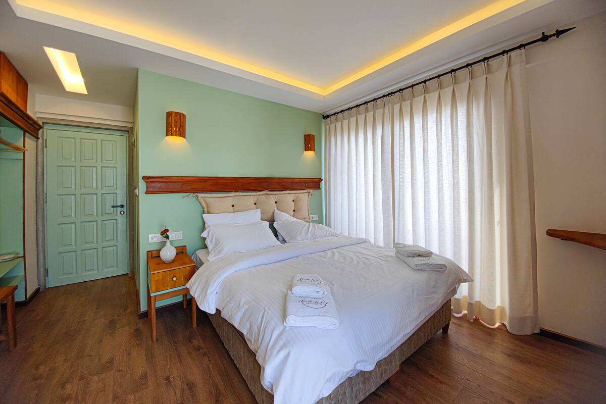 Egyptian cotton sheets, premium bedding, down duvets, memory-foam beds