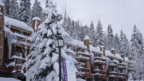 A snow-covered building with a sign indicating "Scade Village". - Mid Century Modern Condo - Deck with Great Views - Heated Pool (Durango)
