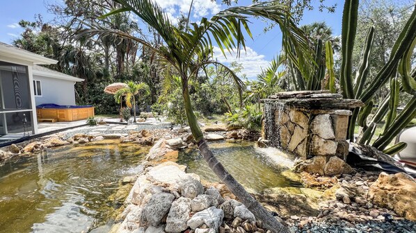 Property grounds - Tropical Home With Waterfall, HotTub, Fenced Yard, Beachy Lounge Area & Pets! (port charlotte)