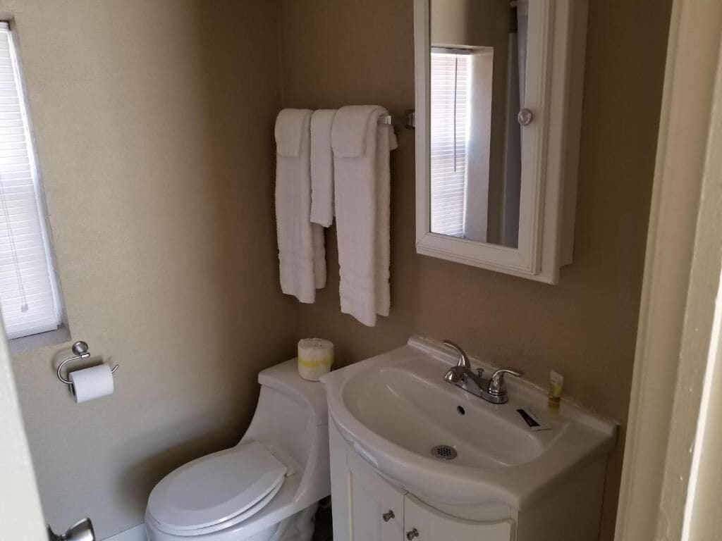 standard single king bed | bathroom | shower, towels