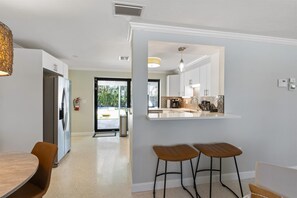 Fridge, microwave, oven, stovetop - Glad Tidings: Heated pool, turfed outdoor lounge and dining area. (Anna Maria)