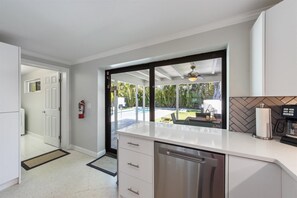 Interior - Glad Tidings: Heated pool, turfed outdoor lounge and dining area. (Anna Maria)