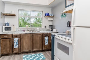 Fridge, microwave, oven, stovetop - HOUSE by Lake Taneycomo at Rockaway Rentals (Rockaway Beach)