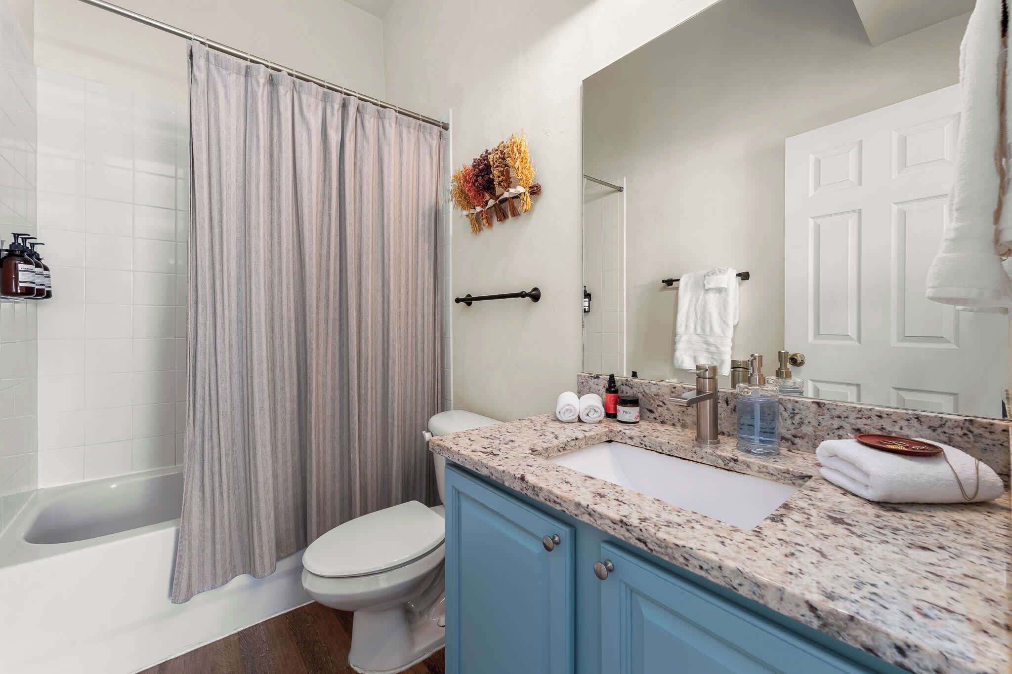 Full Bathroom with Towels and High Water Pressure located in both bedrooms upstairs