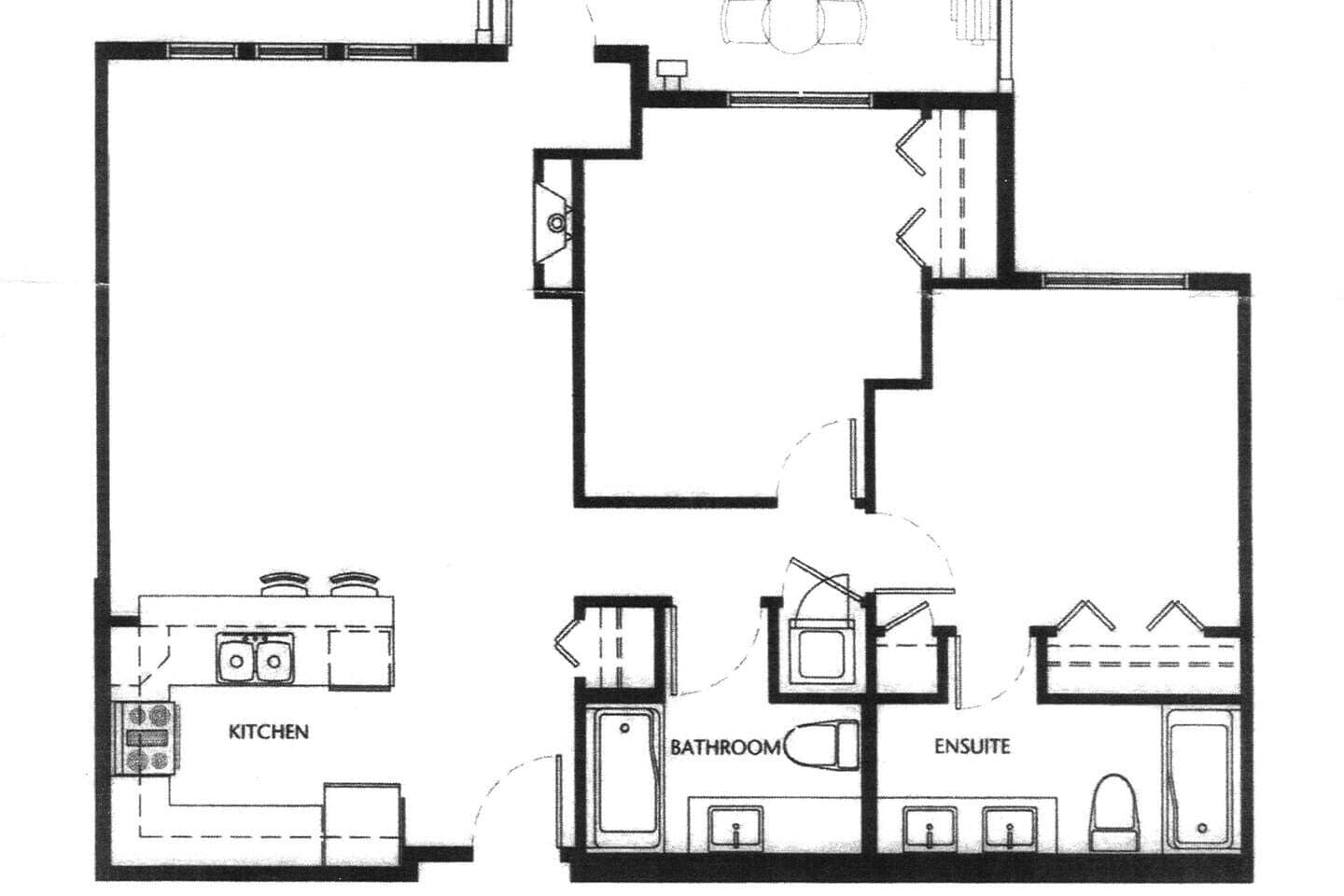 A floor plan with a kitchen, bathroom, and ensuite.