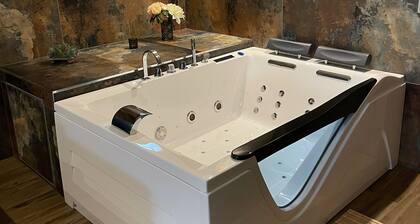 Suite romantique avec baignoire balnéothérapie