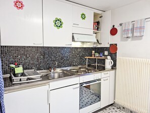 Fridge, microwave, oven, cookware/dishes/utensils