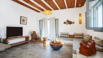 Perseus Apartment | Living area | 32-inch Smart TV with digital channels, TV
