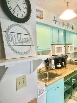 Fridge, oven, stovetop, coffee/tea maker - Seascape - Ocean View at Symphony Beach Club (Ormond Beach)