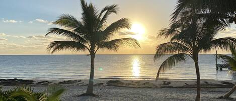 On the beach, sun-loungers, beach towels