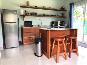 Fridge, stovetop, coffee/tea maker, toaster