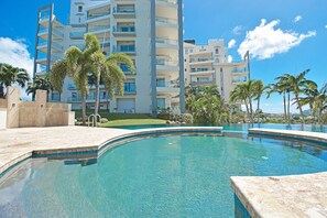 Outdoor pool, a heated pool - Island Time- Luxurious 2 BR/ 2 Bath Condo- Stunning Views of Anguilla and SXM (Maho)