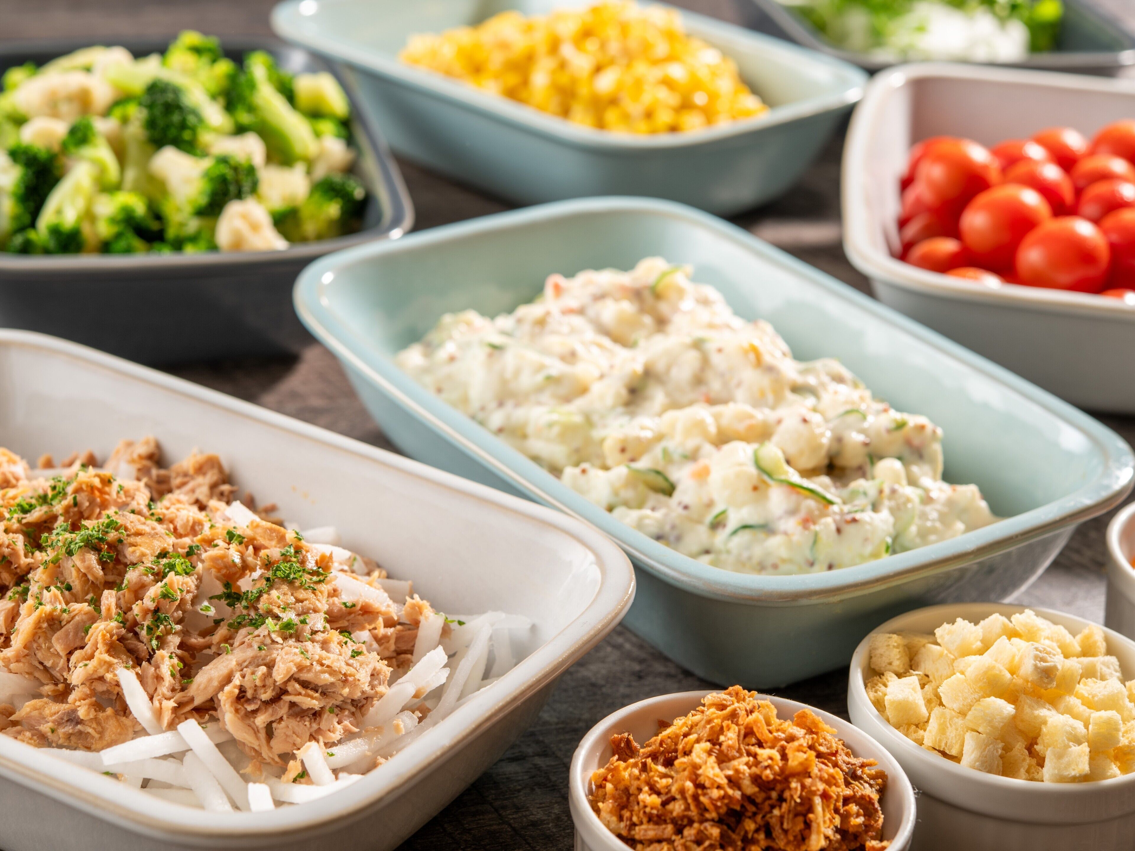 A variety of food dishes in different bowls.