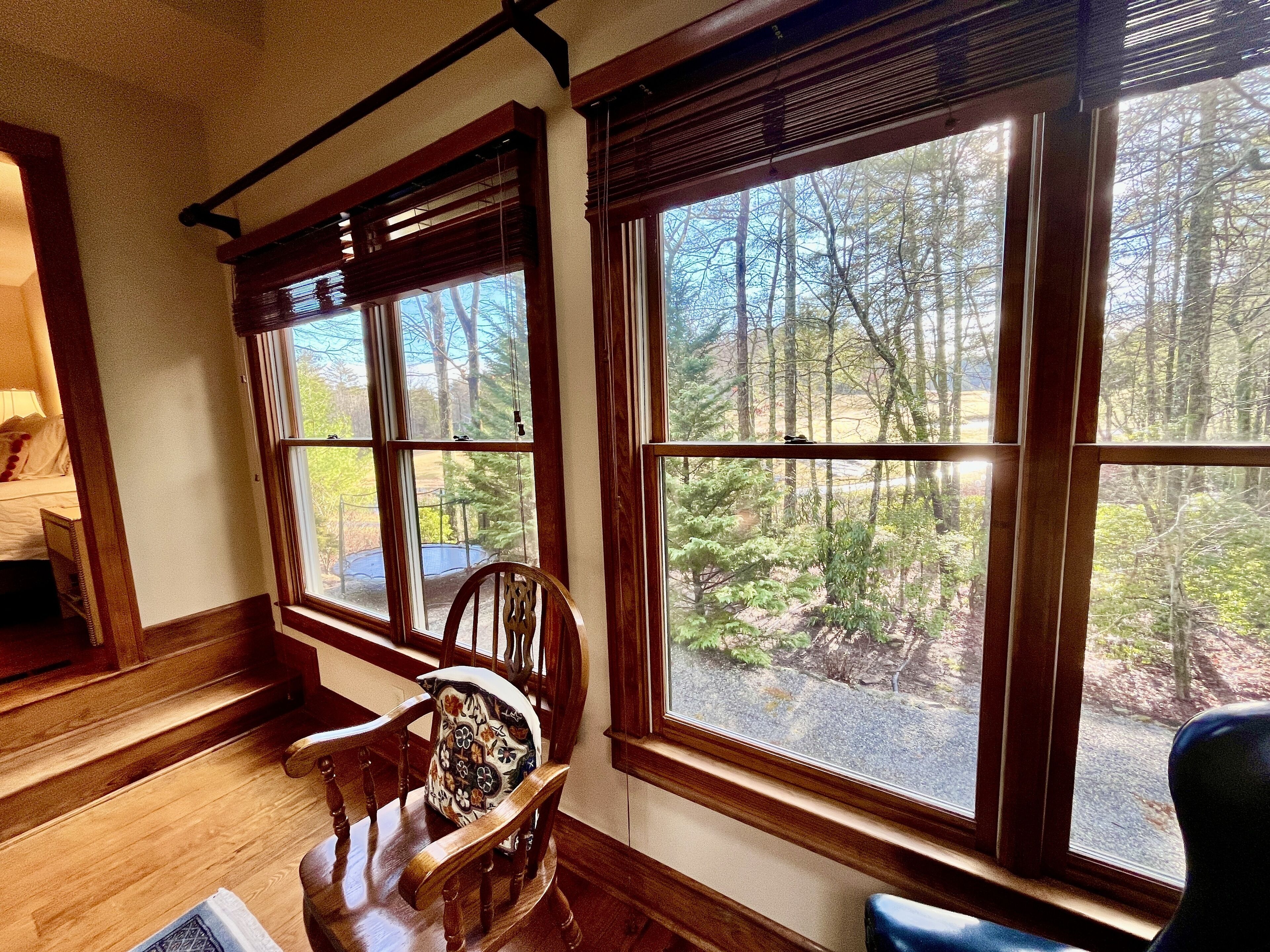 Side view of golf course from airy office; view of trampoline