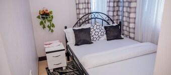 Private room in a villa - located in Sinza