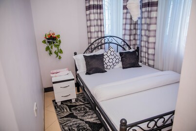 Private room in a villa - located in Sinza