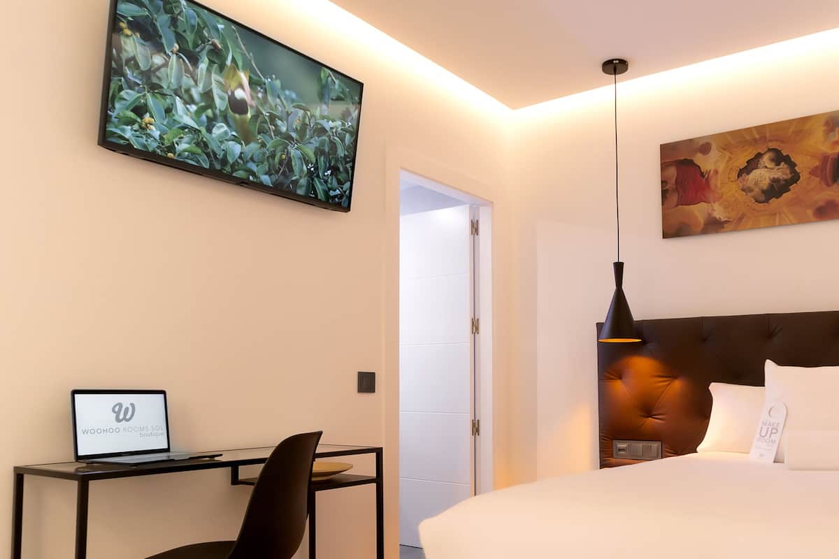 Kamar Single Deluks | Seprai premium, selimut bulu angsa, bantalan ekstra lembut, dan minibar