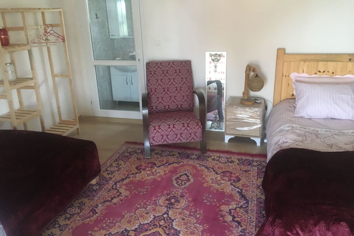 Comfort Room | 1 bedroom, blackout drapes, iron/ironing board, free WiFi
