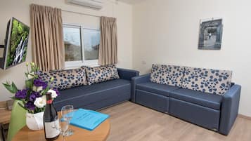 Familienstudio | Wohnbereich | Fernseher