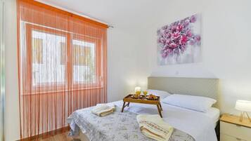 2 bedrooms, premium bedding, down duvets, desk