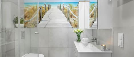 Superior Apartment | Bathroom | Shower, towels, soap, toilet paper