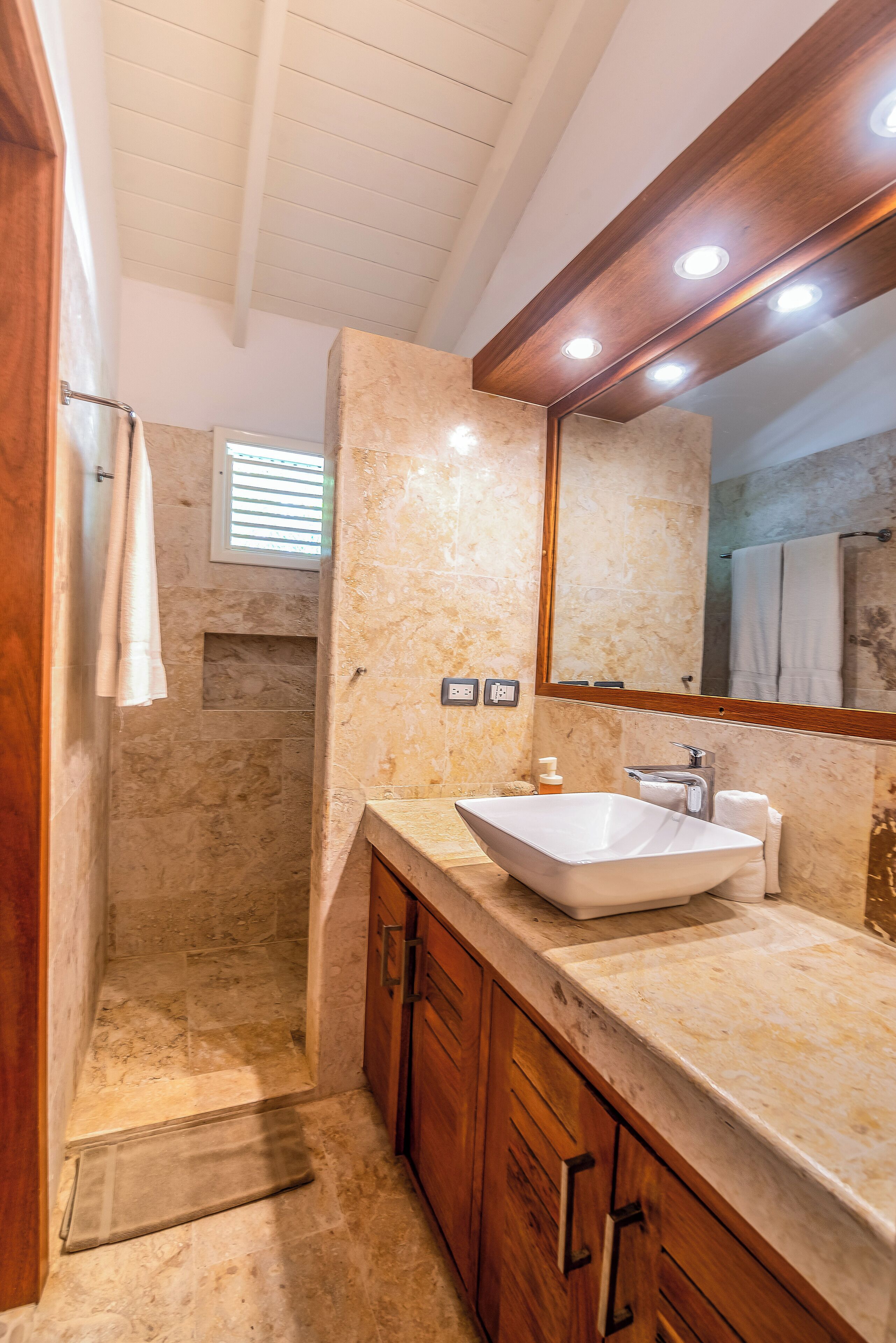 Shower, hair dryer, towels, toilet paper