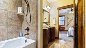 Combined shower/bathtub, hair dryer, towels, soap