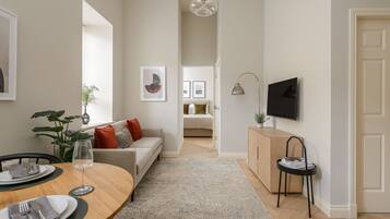 Superior Apartment | Living area | 42-inch Smart TV with digital channels, TV, Netflix