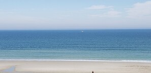 On the beach, sun-loungers, beach towels