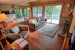 TV, fireplace - The Tree House in Fleetwood, NC: Cozy 2BR townhome for up to 6 guests. (Fleetwood)