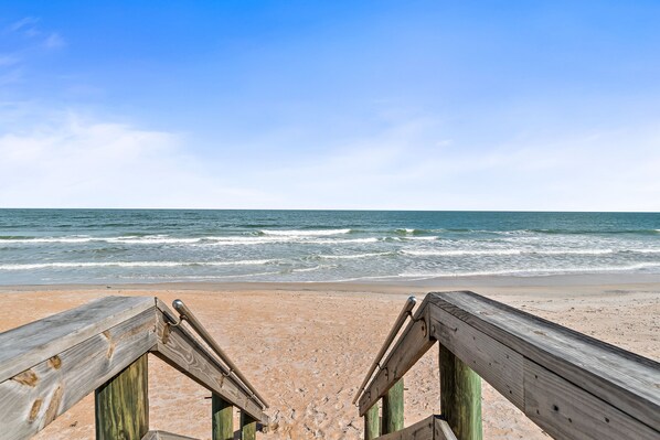 On the beach, sun loungers, beach towels