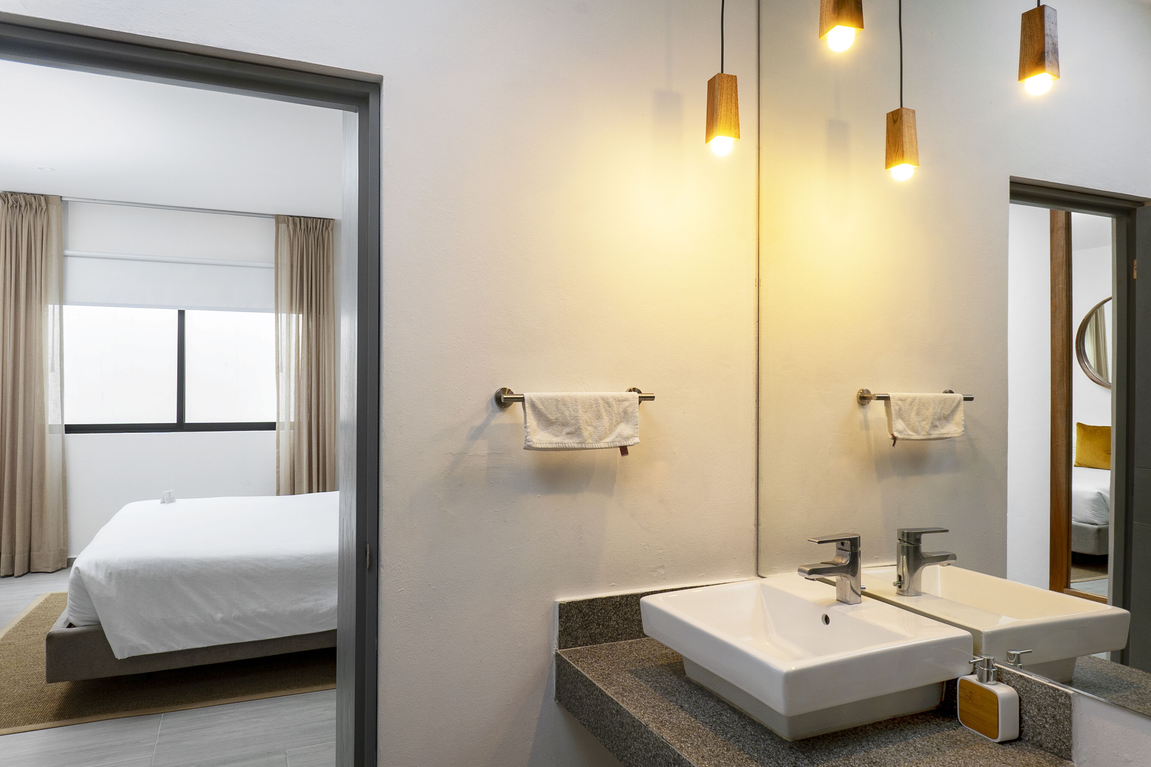 double room, 1 king bed | bathroom | shower, rainfall showerhead, hair dryer, towels