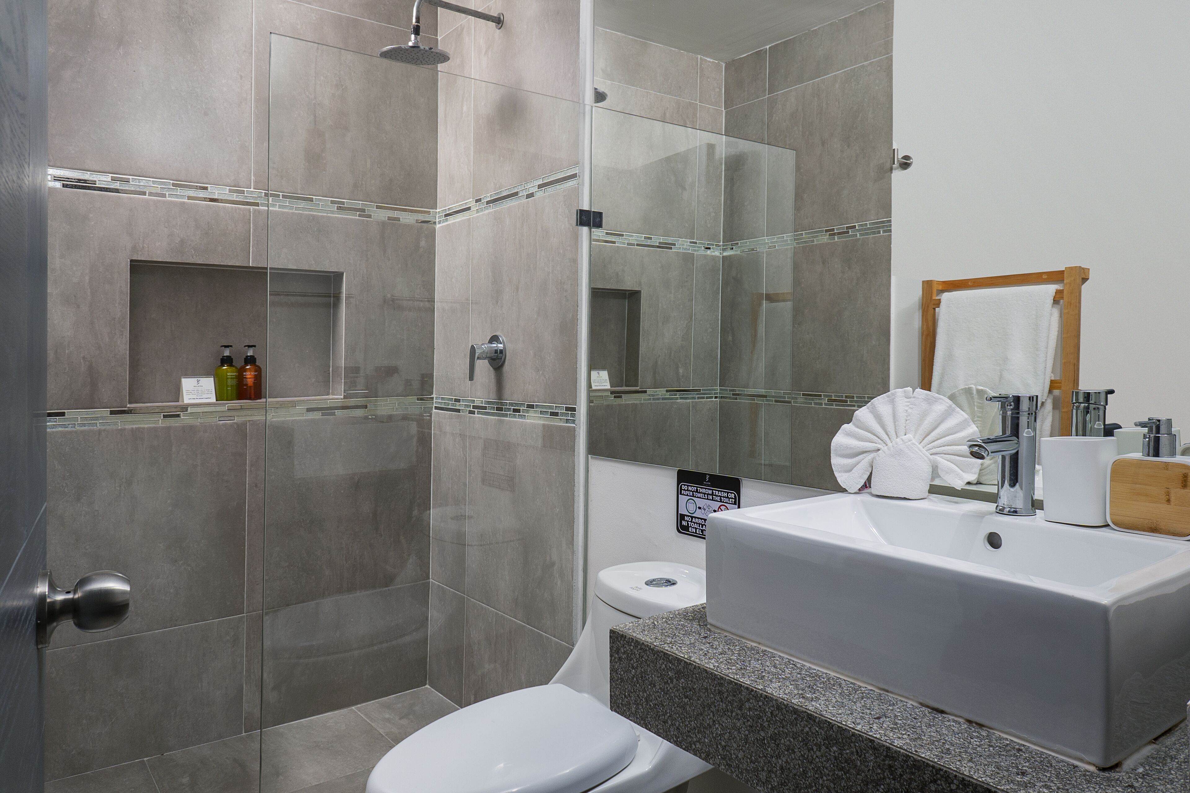 shower, rainfall showerhead, hair dryer, towels