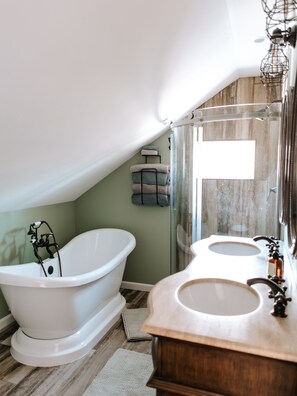 Bathtub, hair dryer, towels, soap