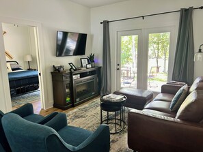 Smart TV, fireplace, books