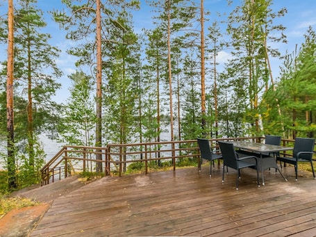 Outdoor dining. Aurinkoranta by Interhome