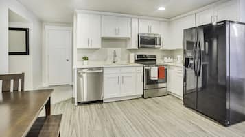 Design Apartment | Private kitchen | Full-size fridge, microwave, oven, stovetop