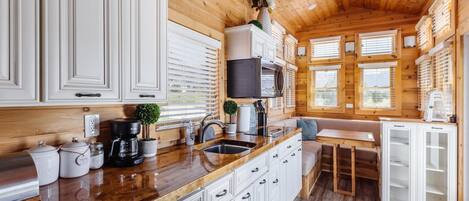 Fridge, microwave, stovetop, coffee/tea maker